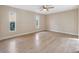 Well-lit bedroom with light walls and laminate flooring at 3127 57Th Avenue E Cir, Bradenton, FL 34203