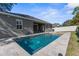 Relaxing pool and spa area in the backyard at 4446 Marsalis Ct, Spring Hill, FL 34609