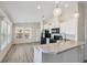 Open concept kitchen with an island and stainless steel appliances at 4620 Tri Par Dr, Sarasota, FL 34234