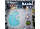 Aerial view of the pool, jacuzzi, deck, patio furniture, and landscaping at 7941 Sycamore Dr, New Port Richey, FL 34654