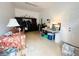 Spacious bonus room with a sofa and ample storage space at 7941 Sycamore Dr, New Port Richey, FL 34654