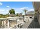 Outdoor deck with multiple seating areas, perfect for entertaining at 7941 Sycamore Dr, New Port Richey, FL 34654