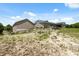 Expansive home with a separate garage and spacious yard showcasing the property's potential at 7941 Sycamore Dr, New Port Richey, FL 34654