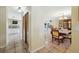Hallway view that showcases the dining room and kitchen at 7941 Sycamore Dr, New Port Richey, FL 34654