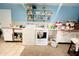 Laundry room with washer, dryer, and additional storage at 7941 Sycamore Dr, New Port Richey, FL 34654