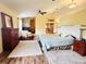 Large main bedroom with hardwood floors and fireplace at 7941 Sycamore Dr, New Port Richey, FL 34654