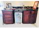 Close-up of wet bar shows counter, sink, and beverage refrigerator at 7941 Sycamore Dr, New Port Richey, FL 34654