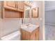 Bathroom with sink, toilet and medicine cabinet at 8455 Elgrove St, Spring Hill, FL 34608