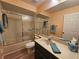 Bathroom with tub, shower, and vanity at 9163 Lingrove Rd, Weeki Wachee, FL 34613