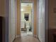 Clean bathroom with toilet, shower, and vanity at 9163 Lingrove Rd, Weeki Wachee, FL 34613