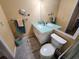 Bathroom with updated vanity and toilet at 9163 Lingrove Rd, Weeki Wachee, FL 34613