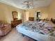 Spacious bedroom with wood floors and built-in dresser at 9163 Lingrove Rd, Weeki Wachee, FL 34613