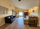 Spacious living room with light flooring and comfortable seating at 9163 Lingrove Rd, Weeki Wachee, FL 34613