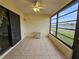 Spacious screened porch overlooking a tranquil lake at 9163 Lingrove Rd, Weeki Wachee, FL 34613