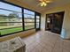 Enjoy the lake view from this screened porch at 9163 Lingrove Rd, Weeki Wachee, FL 34613