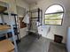 Storage room with shelving and utility sink at 9163 Lingrove Rd, Weeki Wachee, FL 34613