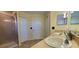 Bathroom with double sinks, a shower, and a separate tub at 10167 Bankston Dr, Hudson, FL 34667