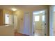 Upstairs hallway with access to bedrooms and laundry at 10167 Bankston Dr, Hudson, FL 34667