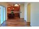 Kitchen with an island and breakfast bar, view from the dining area at 10167 Bankston Dr, Hudson, FL 34667