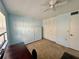 Bright bedroom with a built-in Murphy bed and closet at 11211 Carriage Hill Dr # 2, Port Richey, FL 34668