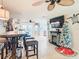 Bright and airy living area with fireplace and bar at 12832 3Rd Isle, Hudson, FL 34667