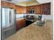 Well-equipped kitchen with stainless steel appliances at 12924 Gulf Blvd # 401, Madeira Beach, FL 33708