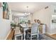 Elegant dining area featuring a large table and mirror at 1354 Shady Pine Way # H2, Tarpon Springs, FL 34688