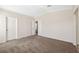 Large bedroom with carpet flooring and ample closet space at 1852 Cypress Point Ln, Sarasota, FL 34234