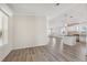 Open concept dining area with hardwood floors and kitchen views at 1852 Cypress Point Ln, Sarasota, FL 34234