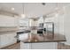 Modern kitchen with white cabinets and a large island at 1852 Cypress Point Ln, Sarasota, FL 34234