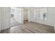 Bright living room with hardwood floors and neutral walls at 1852 Cypress Point Ln, Sarasota, FL 34234
