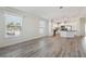Spacious living room with light walls and vinyl wood flooring at 1852 Cypress Point Ln, Sarasota, FL 34234