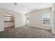 Spacious main bedroom with en-suite bathroom and carpet flooring at 1852 Cypress Point Ln, Sarasota, FL 34234