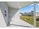 Covered patio with concrete flooring and stairs at 1852 Cypress Point Ln, Sarasota, FL 34234