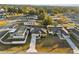 Aerial view of a house and surrounding neighborhood at 26416 Mcallister St, Brooksville, FL 34602