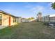 Large fenced backyard with grassy area at 26416 Mcallister St, Brooksville, FL 34602