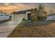 Charming one-story house with attached garage at 26416 Mcallister St, Brooksville, FL 34602