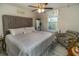 Spacious main bedroom with king-size bed and sitting area at 3168 Sea Grape Dr, Hernando Beach, FL 34607