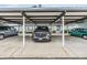 Covered parking carport with plenty of space for vehicles at 3644 Trophy Blvd, New Port Richey, FL 34655