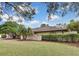 Single-story home with attractive landscaping and a brick facade at 4264 River Birch Dr, Spring Hill, FL 34607