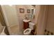 Bathroom with single sink vanity and toilet at 4746 Azalea Dr # 209, New Port Richey, FL 34652