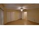 Spacious bedroom with tile floors and access to hallway at 4746 Azalea Dr # 209, New Port Richey, FL 34652