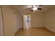 Bright bedroom with tile flooring and ceiling fan at 4746 Azalea Dr # 209, New Port Richey, FL 34652
