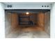 Empty garage with shelving and a chair at 4746 Azalea Dr # 209, New Port Richey, FL 34652