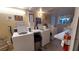 Shared laundry room with several washing machines and dryers at 4746 Azalea Dr # 209, New Port Richey, FL 34652