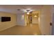 Spacious living room with view into kitchen and dining area at 4746 Azalea Dr # 209, New Port Richey, FL 34652