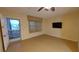 Bright living room featuring tile floors and a view to outside at 4746 Azalea Dr # 209, New Port Richey, FL 34652