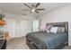 Bright bedroom with double closets and ceiling fan at 5406 Captains Ct, New Port Richey, FL 34652