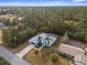 Aerial view of single-Gathering home with pool and large lot at 6225 Hancock Ave, Spring Hill, FL 34608