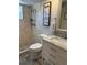 Bathroom with shower, toilet, and marble vanity at 8448 Foxboro Ln, Spring Hill, FL 34608